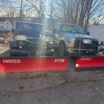 Commercial parking lot snow plowing service during winter conditions
